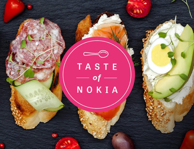 Taste of Nokia -tapahtuman logo, jonka taustalla pieniä leipäsiä maisteluannoksina.